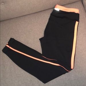 Lululemon black leggings with hot pink stripe, s 6
